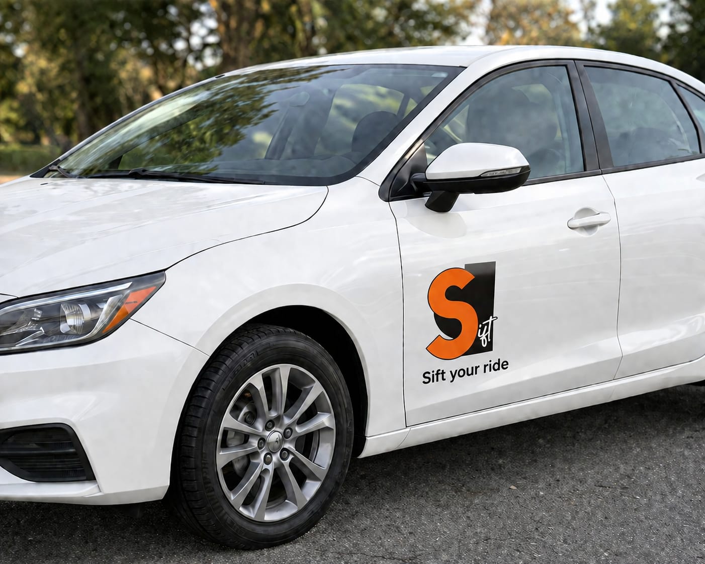 White Sift-branded sedan with the Sift your ride door decal